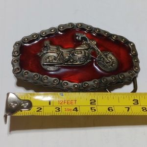 Harley Davidson belt buckle with motorcycle.